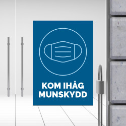 Kom ihåg munskydd – informationsskylt